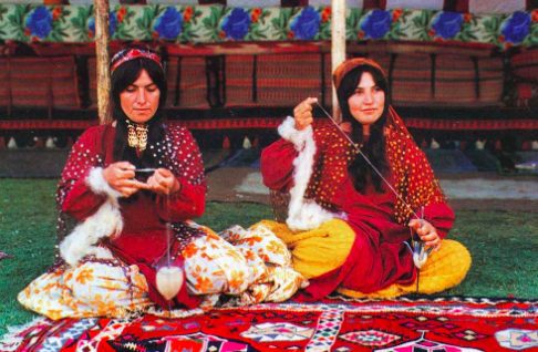 Two Women From The Iranian Ghashghayi Ashayer(Tribe) As Engaged In Producing A Carpet