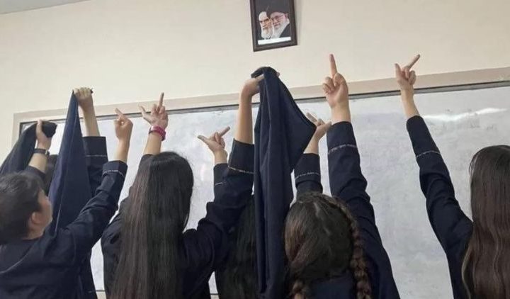 Iranian schoolgirls protest the regime by taking off their hijabs