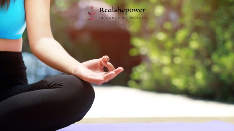 Half Image Of A Cross Legged Woman Sitting In A Meditative Posture With A Greenary At The Background. Transform Your Life: The Power Of Self-Care For The Soul - Discover The Importance Of Spiritual Well-Being