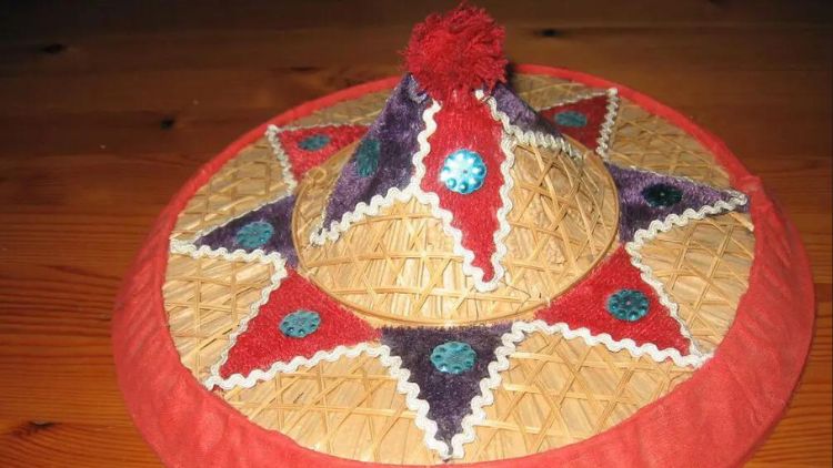 Japi, A Bamboo Hat With Colorful Designs, Symbolizes Assamese Culture And Identity In Northeastern India.