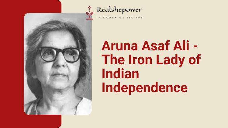 A Black And White Photograph Of Aruna Asaf Ali, A Prominent Female Freedom Fighter In India'S Struggle For Independence. She Is Wearing A Saree And A Serious Expression On Her Face. Her Hair Is Tied Back In A Bun And She Is Looking Directly At The Camera.