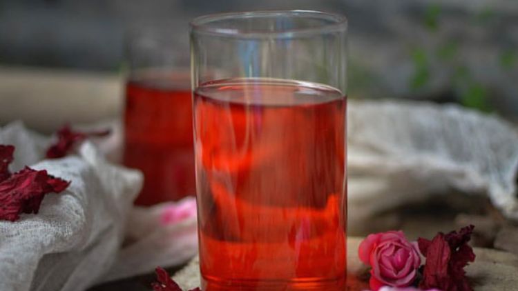 Buransh Is A Refreshing Beverage Made From The Bright Red Flowers Of The Rhododendron Plant, Offering A Unique Floral Taste With A Hint Of Sweetness.

