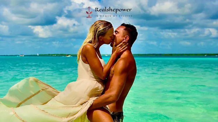 Understanding Attachment Styles For Better Relationships 4 A Couple Is Kissing Each Other On A Beach To Bring The Love Back In Their Relationship