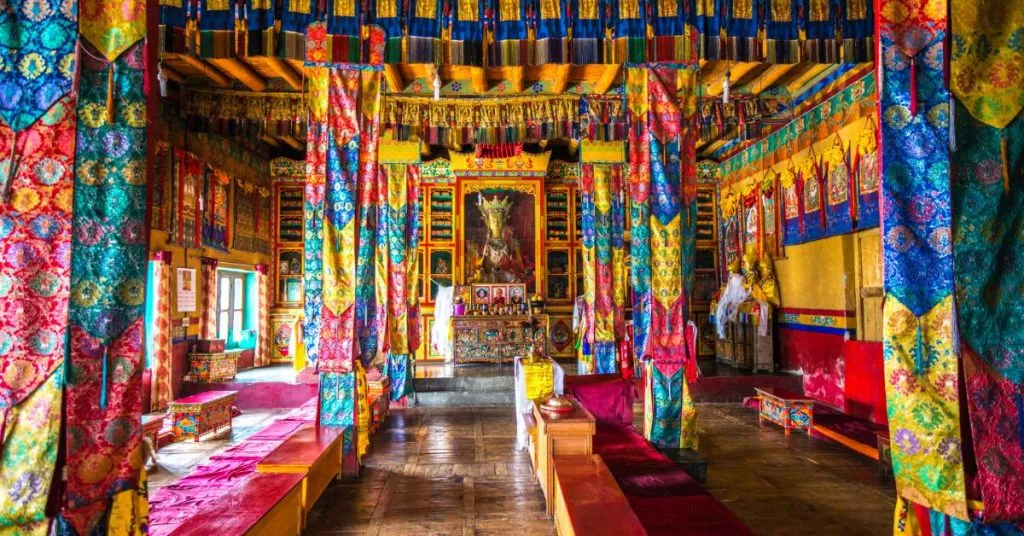 Discover The Ancient Beauty Of Diskit Monastery In Nubra Valley: You Won’t Believe What You’ll See! 3 The Main Prayer Hall Of Diskit Gompa, Adorned With Intricate Tibetan Art And Colorful Fabrics